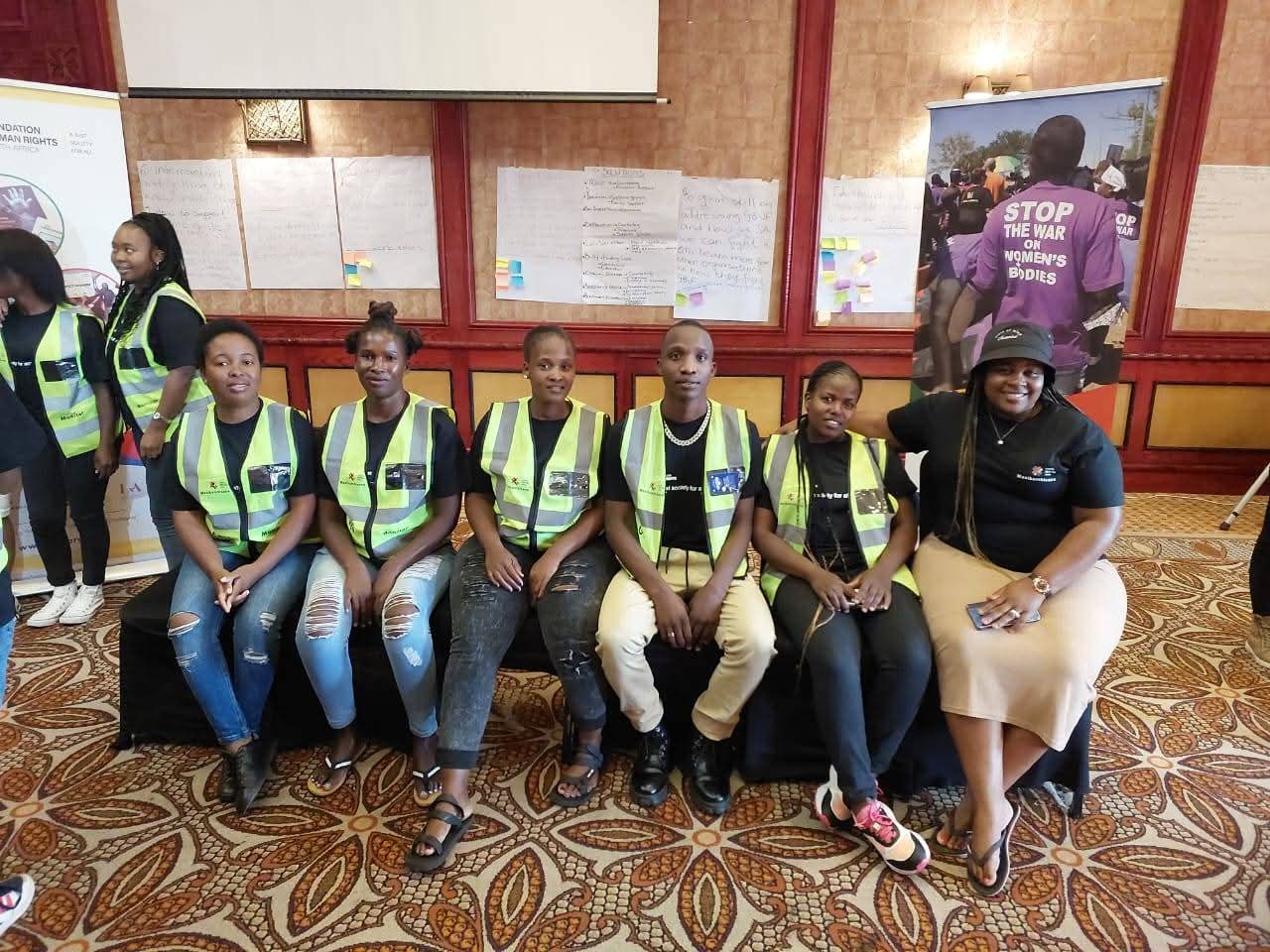 Centre team in reflective vests at a GBV awareness workshop